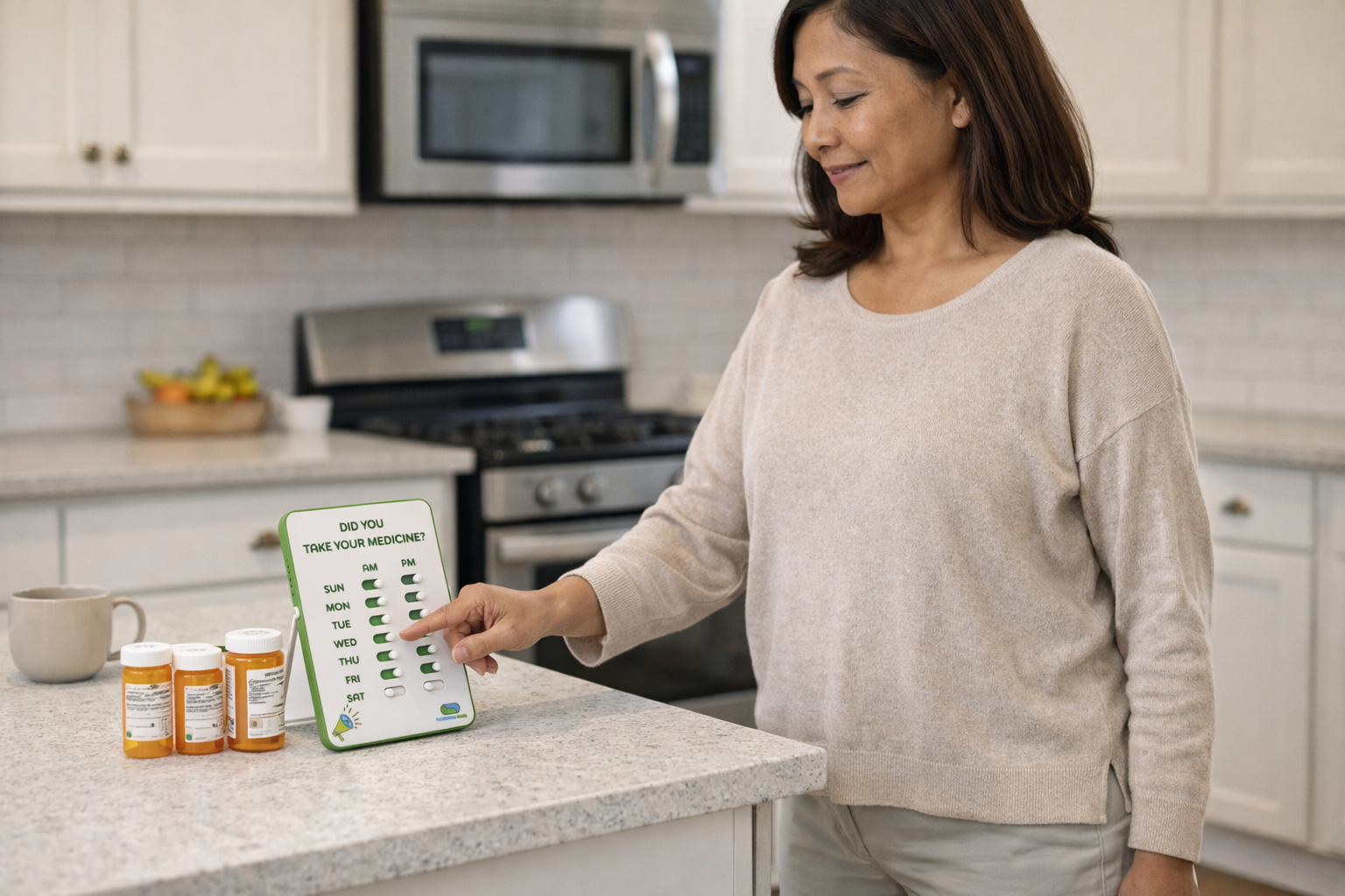 Woman using a digital device in a kitchen with medication bottles on the counter
